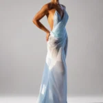 Sky Blue Sheer Slip Maxi Dress by ELYRA LABEL featuring a plunging V-neck, spaghetti straps, open-back design, and flowing sheer maxi silhouette